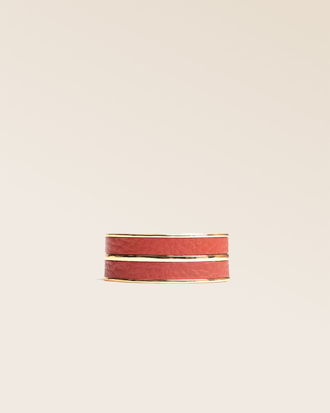 Our Adeline bracelet in terracotta vicuña-style leather, seen from the front in the studio.
