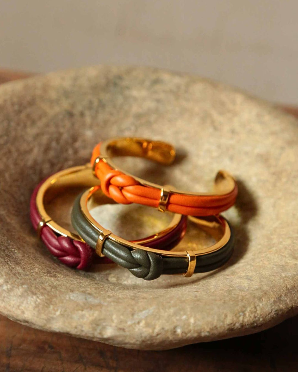 Our Doris bracelet in orange, khaki and burgundy lambskin seen in ambiance.