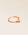 Notre bracelet Jumping Renouard en cuir d'agneau orange et pompon camel, vu de quart en studio.
