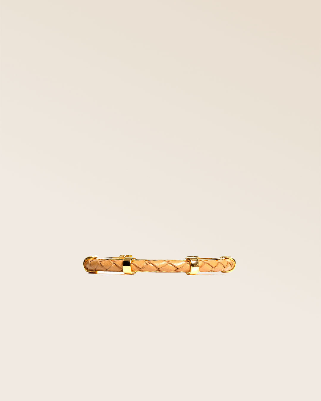 Our Lisbon bracelet in camel woven lambskin seen from the front in the studio.
