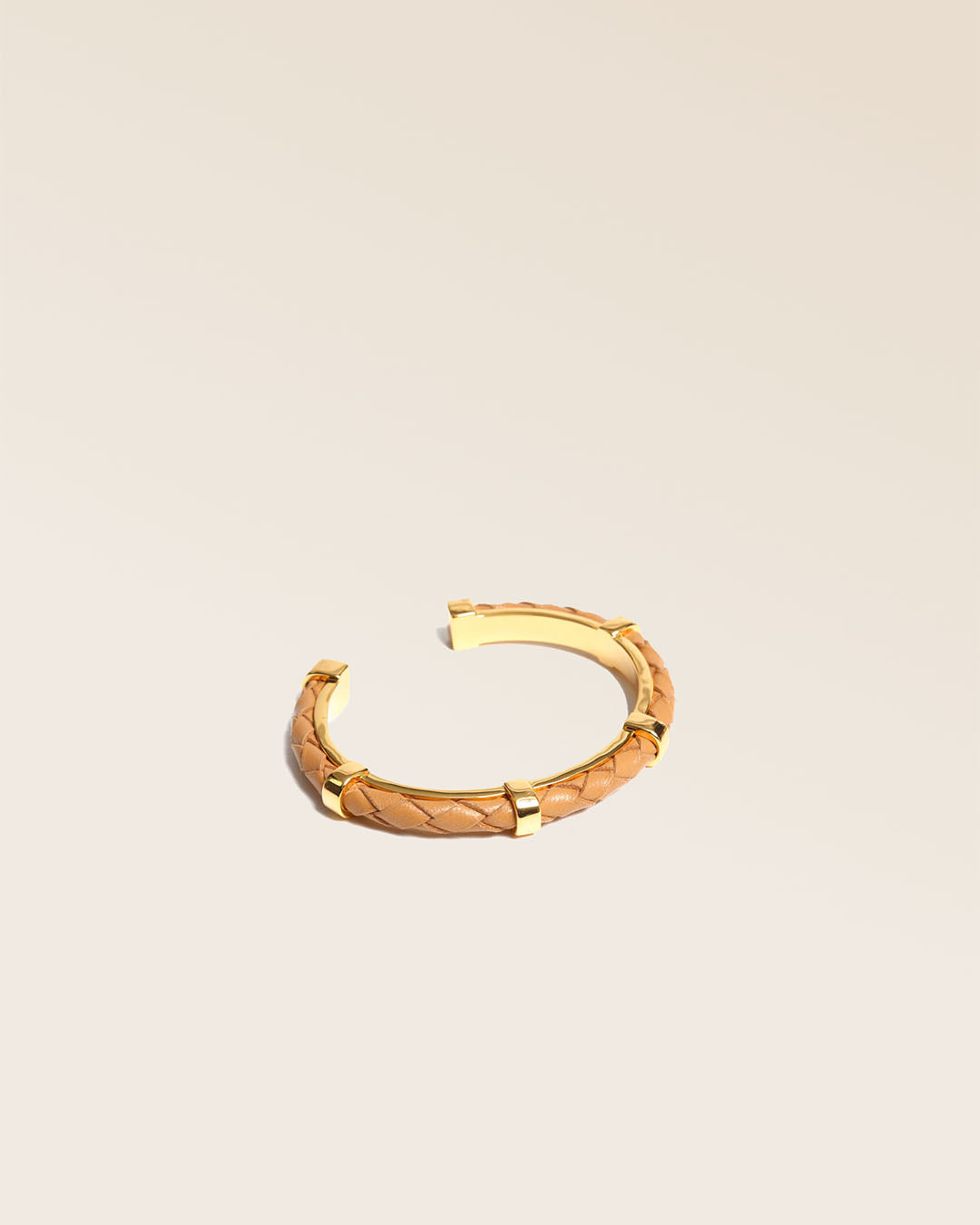 Our Lisbon bracelet in camel woven lambskin seen from the quarter in the studio.