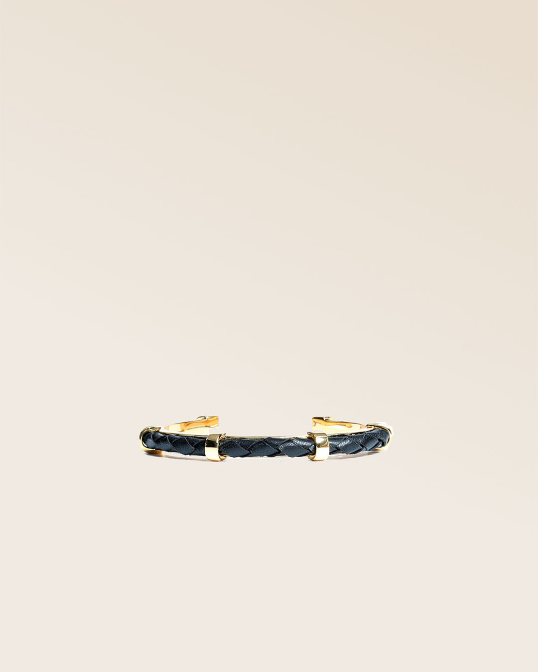 Our Lisbon bracelet in black woven lambskin seen from the front in the studio