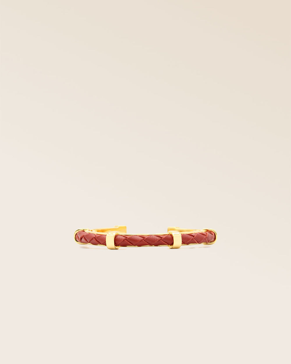 Our Lisbon bracelet in terracotta woven lambskin seen from the front in the studio.