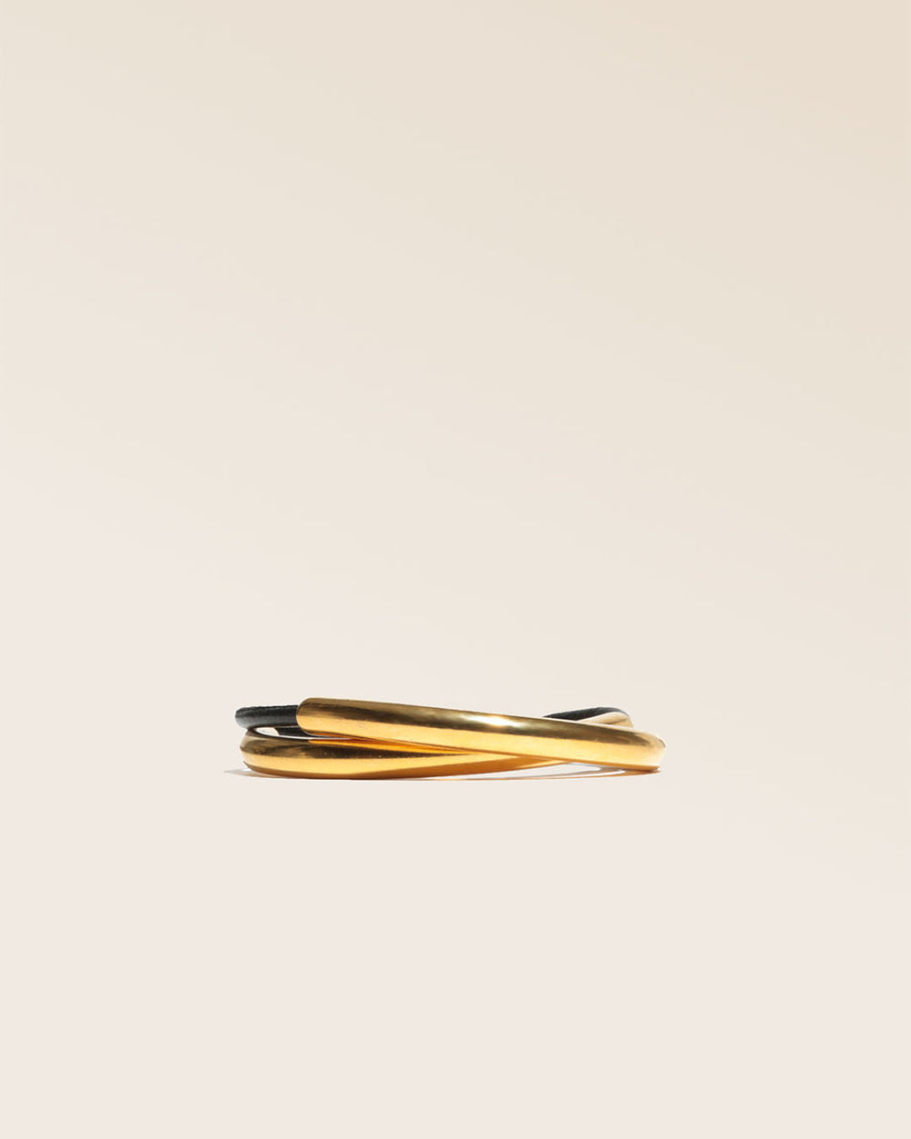 Our Velvet bracelet in black lambskin seen from the front in the studio.