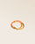 Notre bracelet Velvet en cuir d'agneau orange vu de quart en studio.