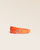 Our Renouard Jockey belt in orange vicuna-style leather, seen from the front in the studio.
