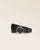Our Tamara Renouard belt, in black vicuna-style leather and gold buckle, seen from the front in the studio.