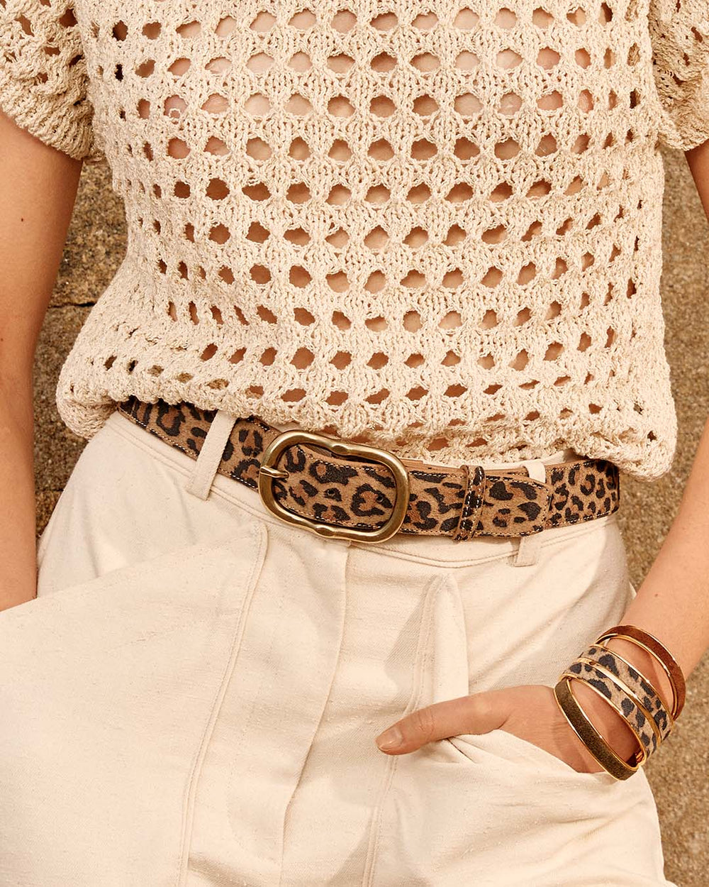 Our Louison belt in leopard suede calf leather as seen on our model.