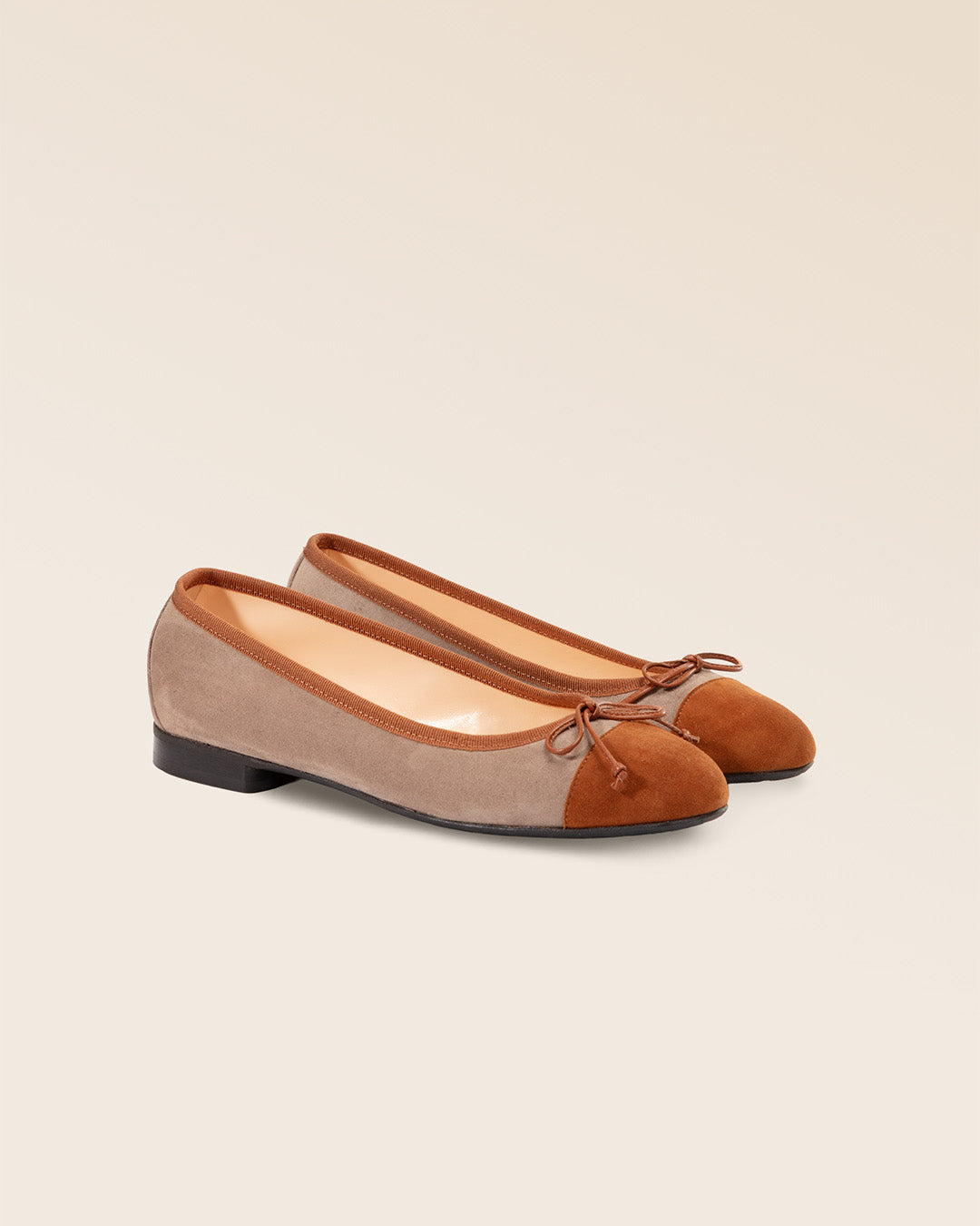 Our Friandise Renouard ballerinas in taupe and fawn nubuck leather, seen from the quarter in the studio.