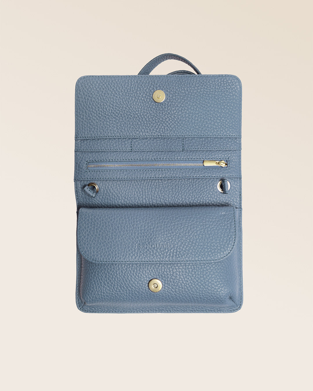 Our Frehel clutch bag in cobalt-blue vicuña-style leather, seen from above in the studio.