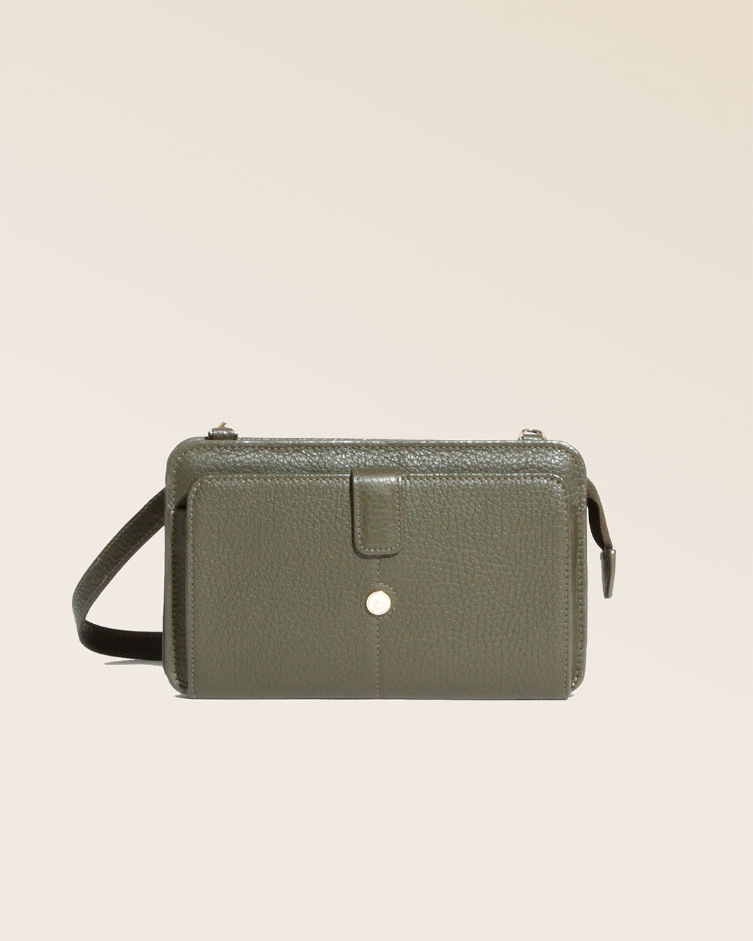 Our khaki vicuña-style leather Manolo clutch seen from the front in the studio.