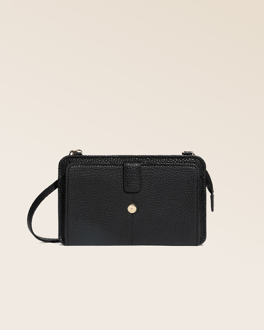 Our black vicuña-style leather Manolo clutch seen from the front in the studio.
