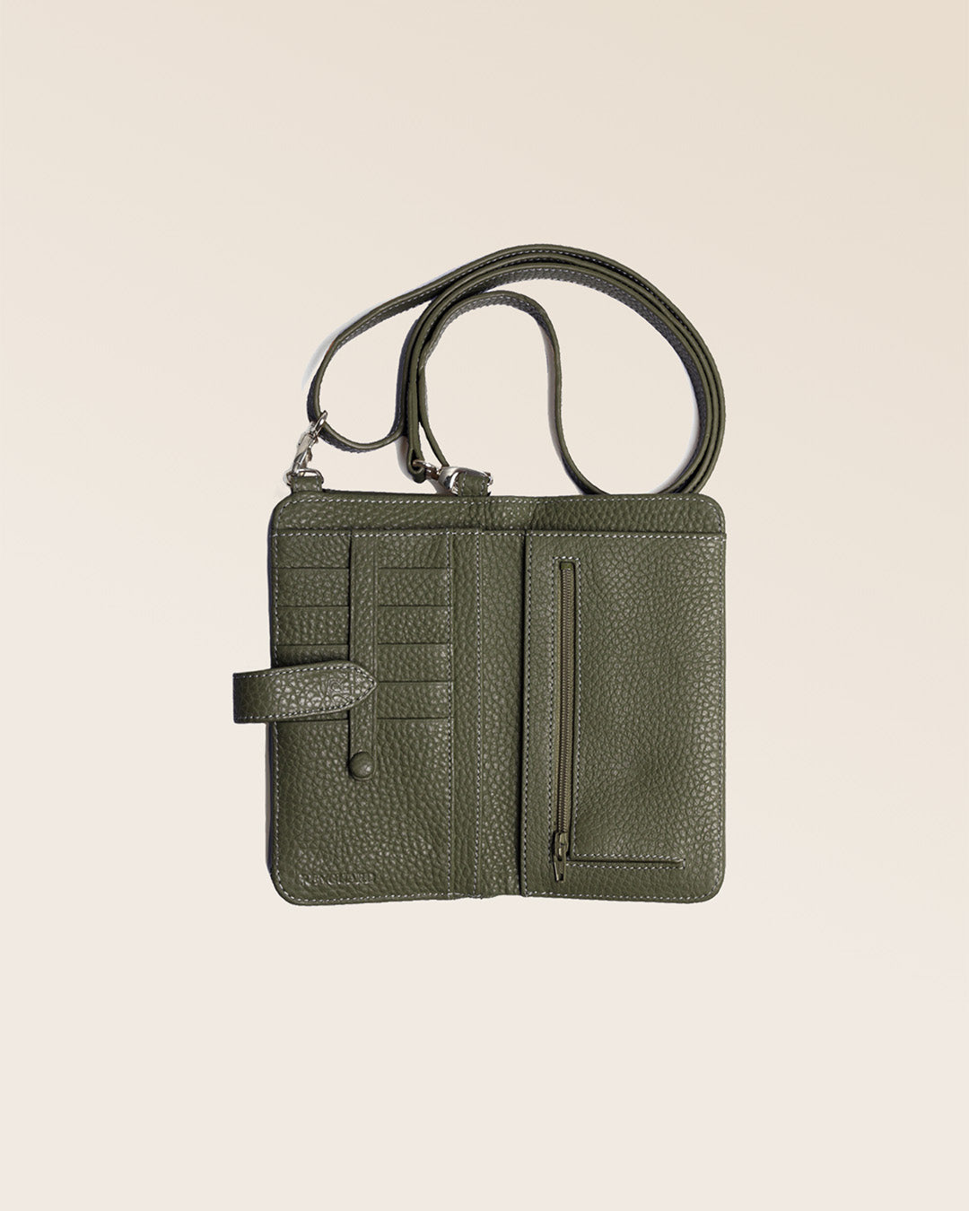 Our Tempo clutch bag in khaki vicuña-style leather, seen from above in the studio.