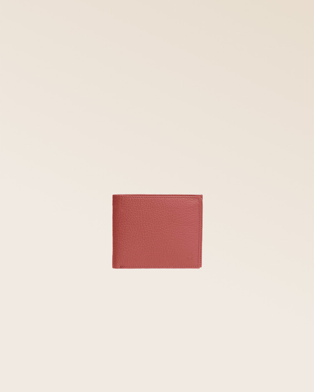 Our CB billfold in terracotta vicuña-style leather, seen from the front in the studio.