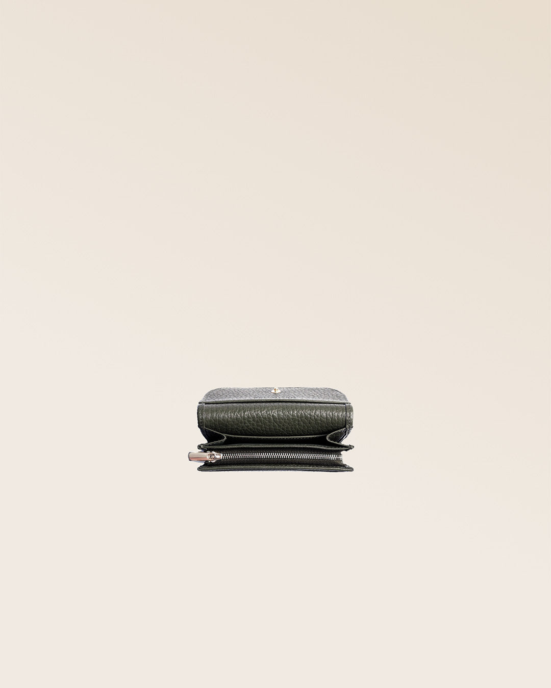 Our Alma Renouard wallet in khaki vicuña-style leather, seen open from above in the studio.