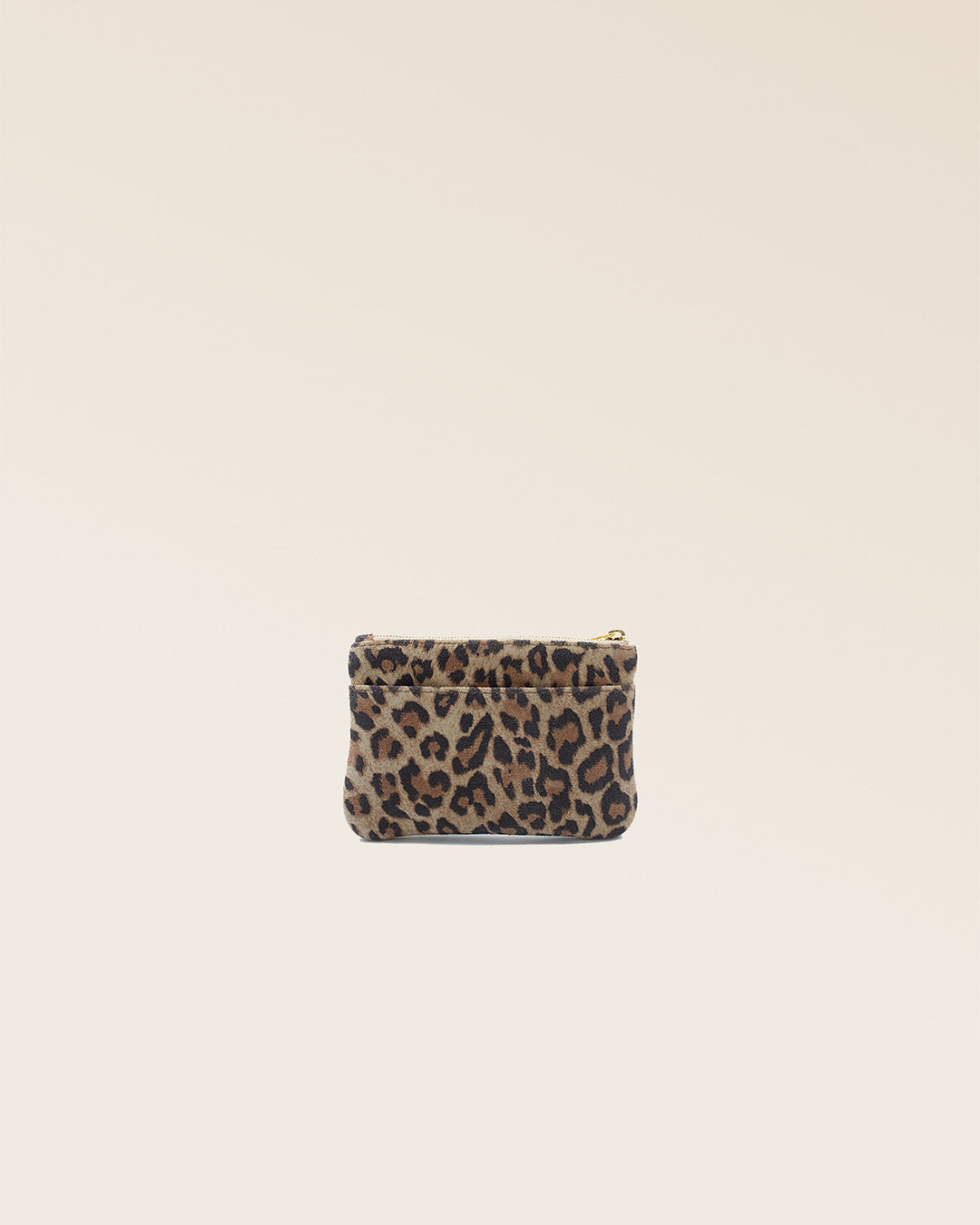 Our Capucine purse in leopard suede calfskin seen from the back in the studio.