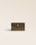 Our Lilou Renouard purse in truffle suede calf leather, seen from the front closed in the studio.