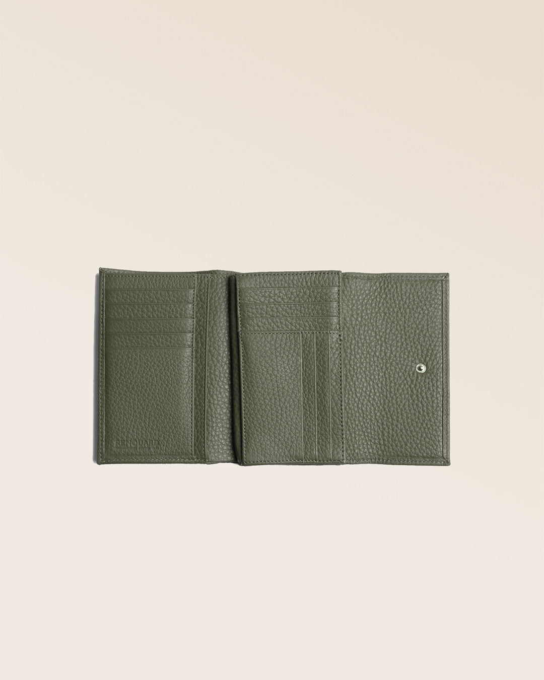 Our Opale wallet in khaki vicuña-style leather seen open in the studio.
