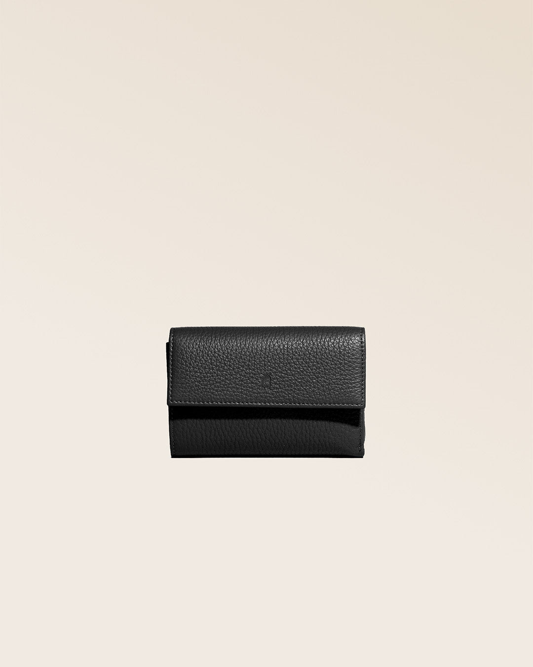 Our Opale purse in black vicuña-style leather, seen from the front in the studio.