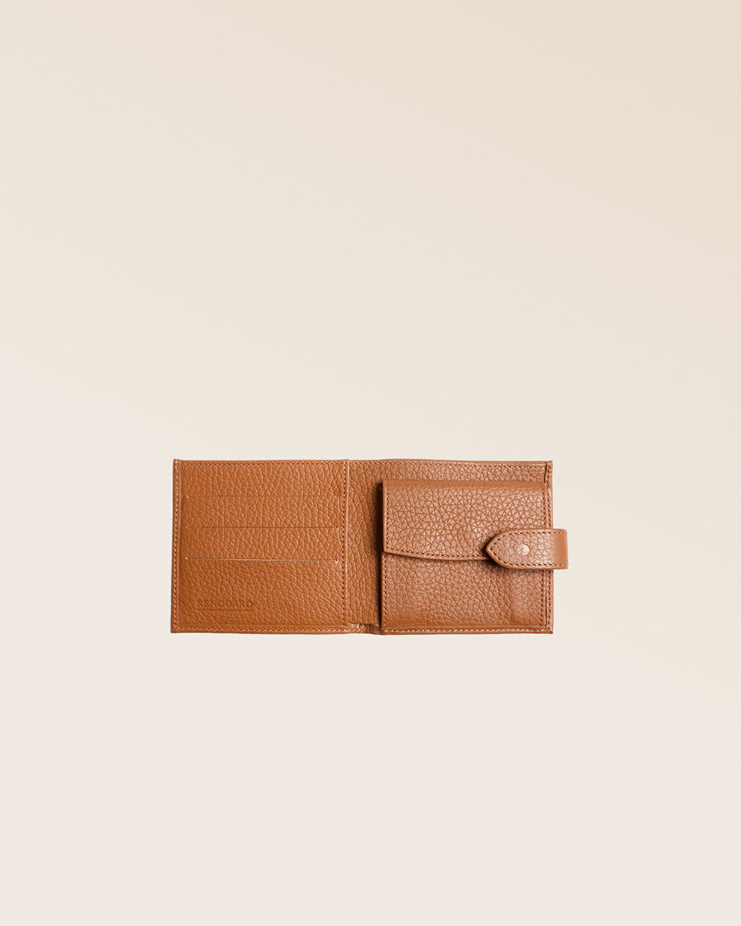 Our Rabat wallet in fawn-colored vicuña leather seen open in the studio.