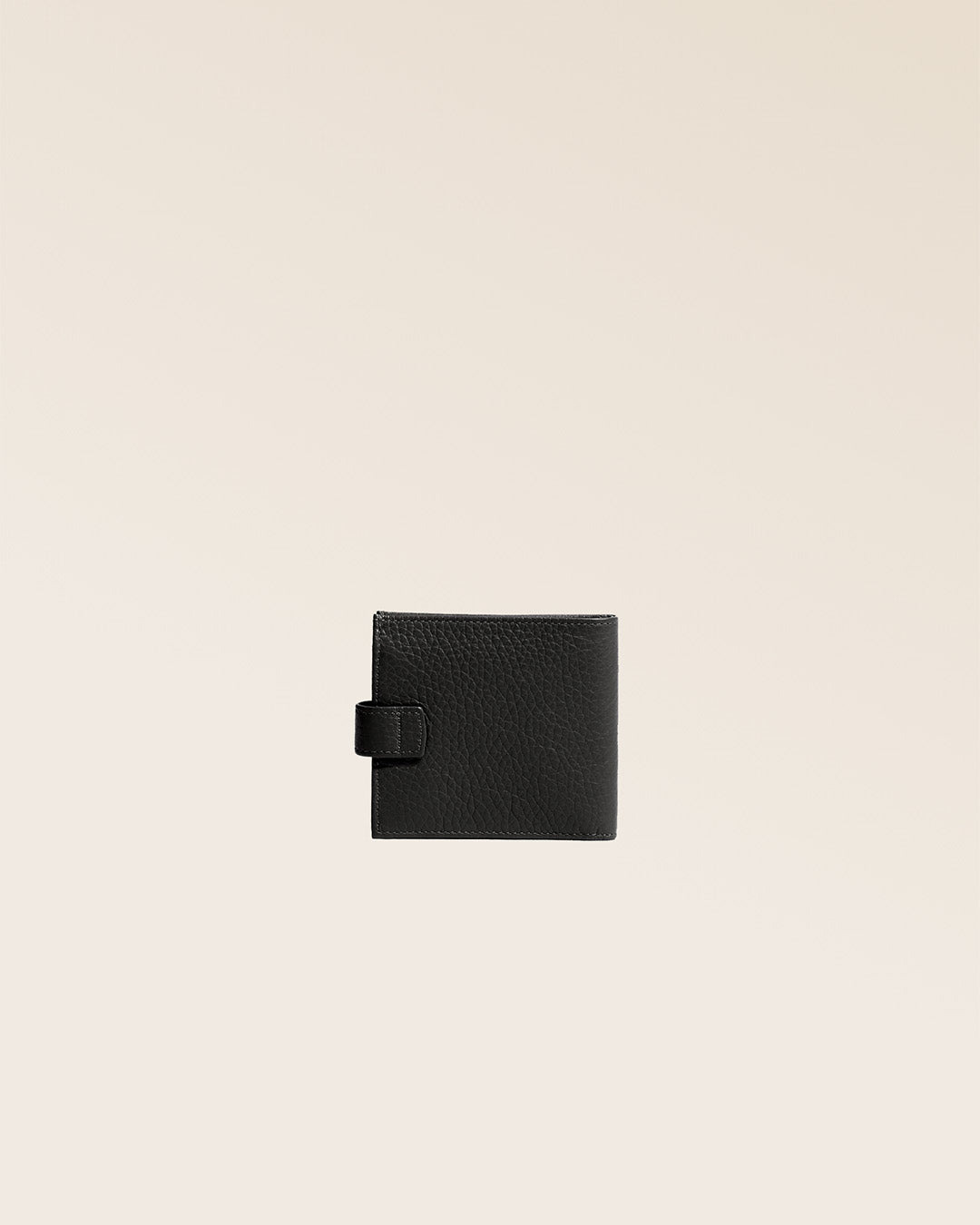 Our black vicuña-style leather Rabat purse seen from the back in the studio.