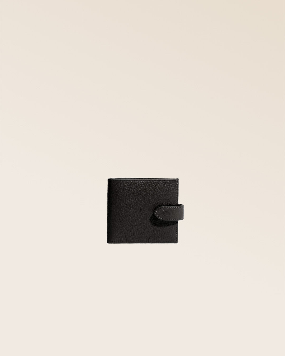 Our Rabat purse in black vicuña-style leather, seen from the front in the studio.