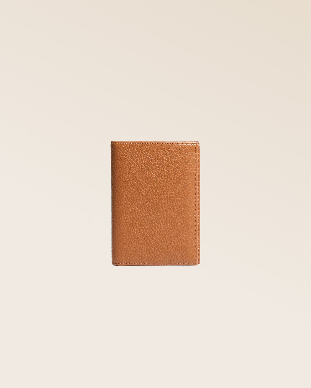 Our Papiers wallet in fawn-colored vicuña leather, seen from the front in the studio.