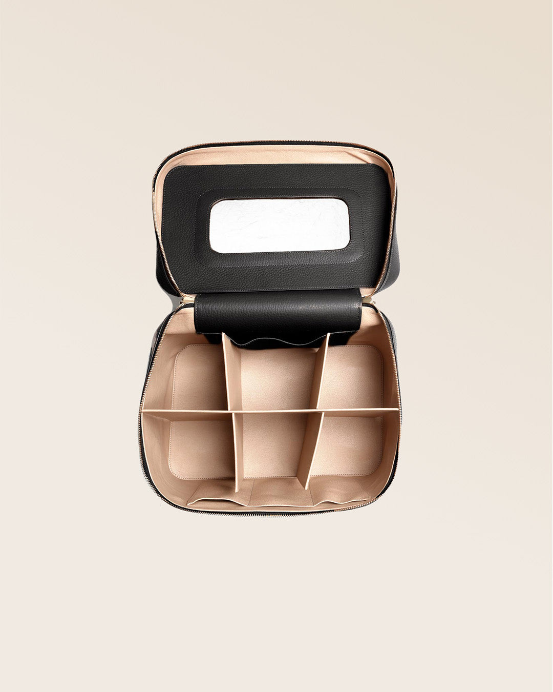 Our large black vicuña-style leather vanity seen from the top open in the studio.