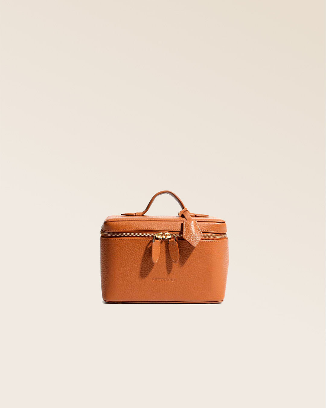 Our little vanity in fawn-colored vicuña leather, seen from the front in the studio.