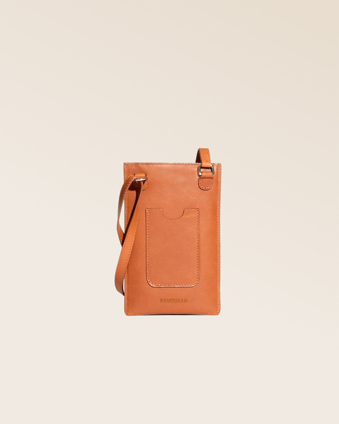 Notre pochette téléphone Étrivière en cuir vintage camel vue de dos en studio.