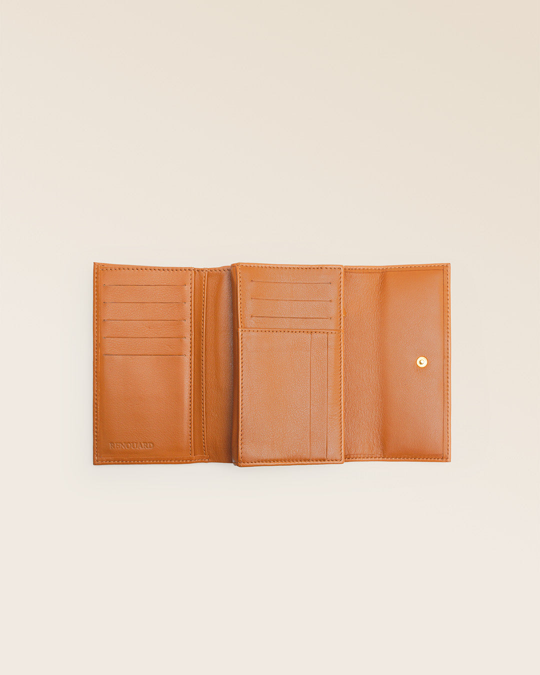 Our Opale Renouard purse in vintage camel leather, seen open in the studio.