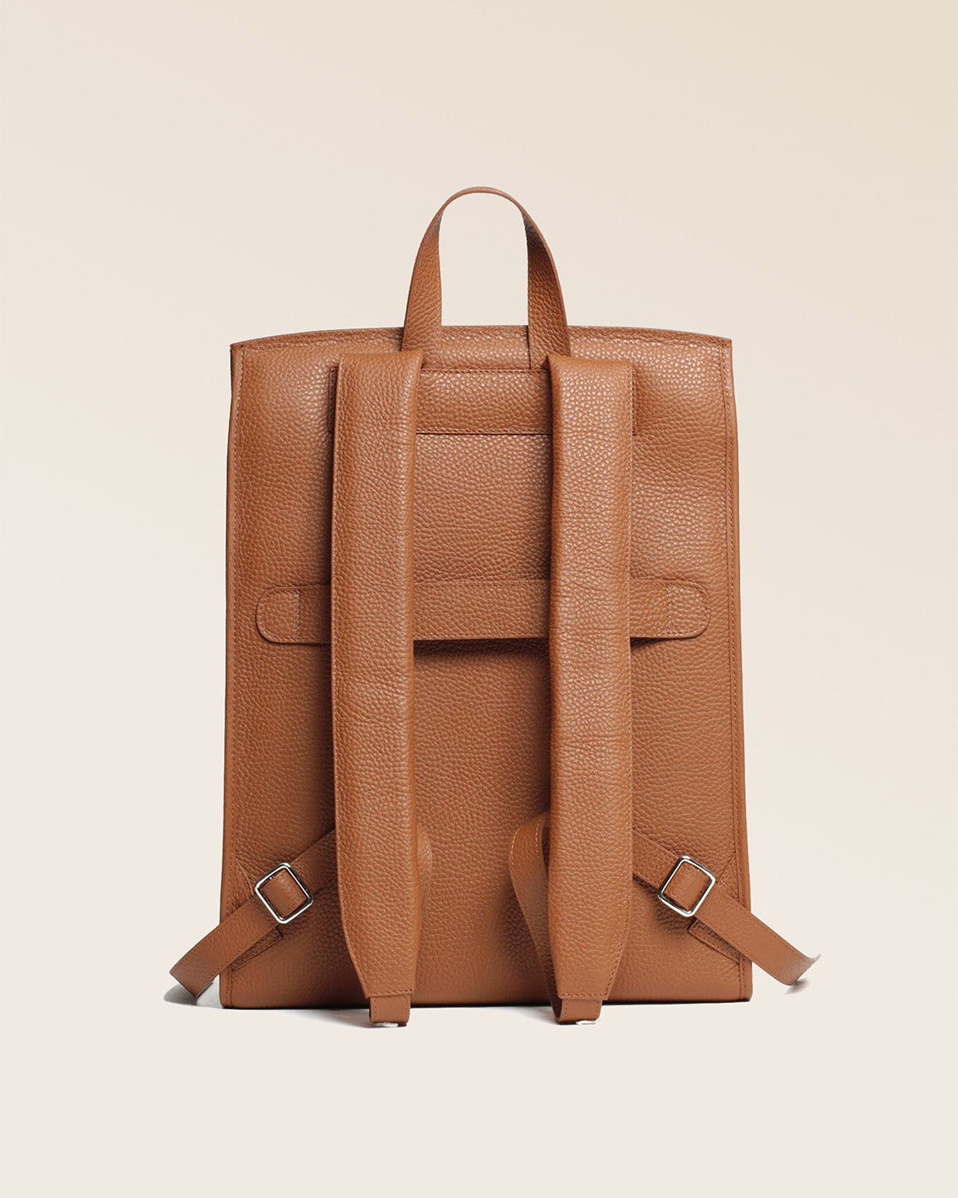 Our Alex backpack in chocolate vicuña leather, seen from the back.