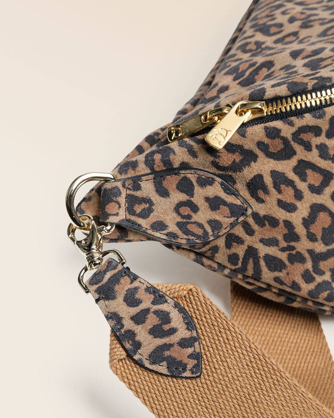 Our Batz clutch bag in suede calf leather seen in detail in the studio.