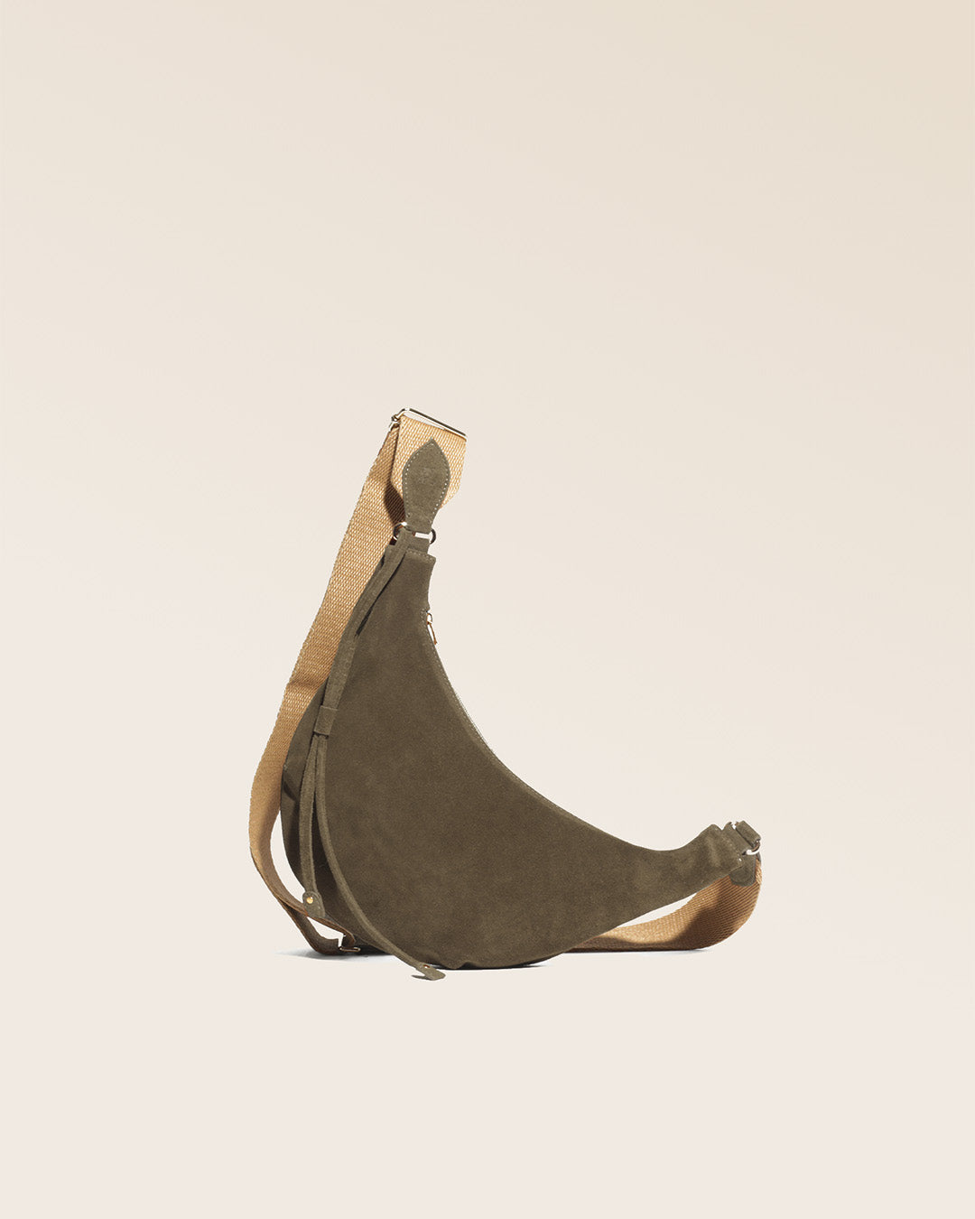 Our Bihan bag in truffle suede as seen from the front in the studio.