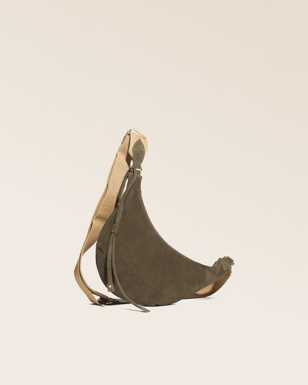 A quarter view of our Bihan bag in truffle suede calf leather.