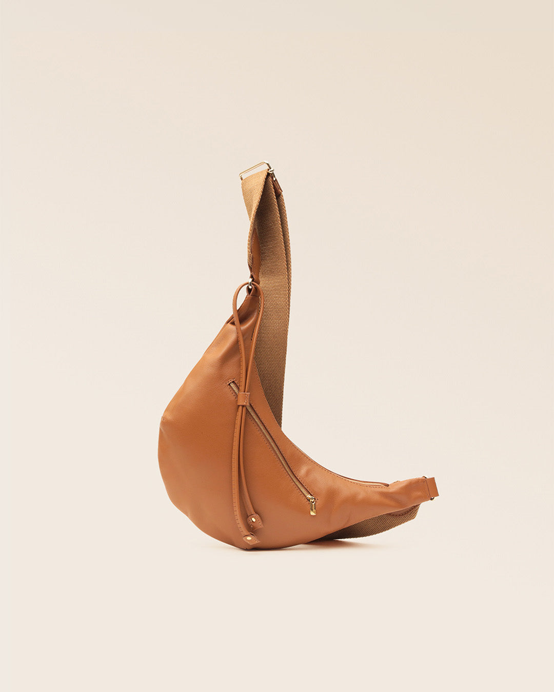Our Bihan bag in vintage camel leather, seen from the back in the studio.