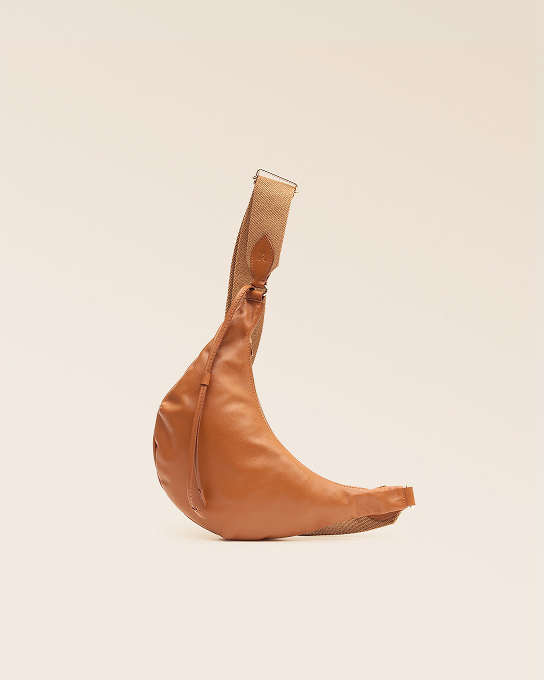 Our Bihan bag in vintage camel leather, seen from the front in the studio.