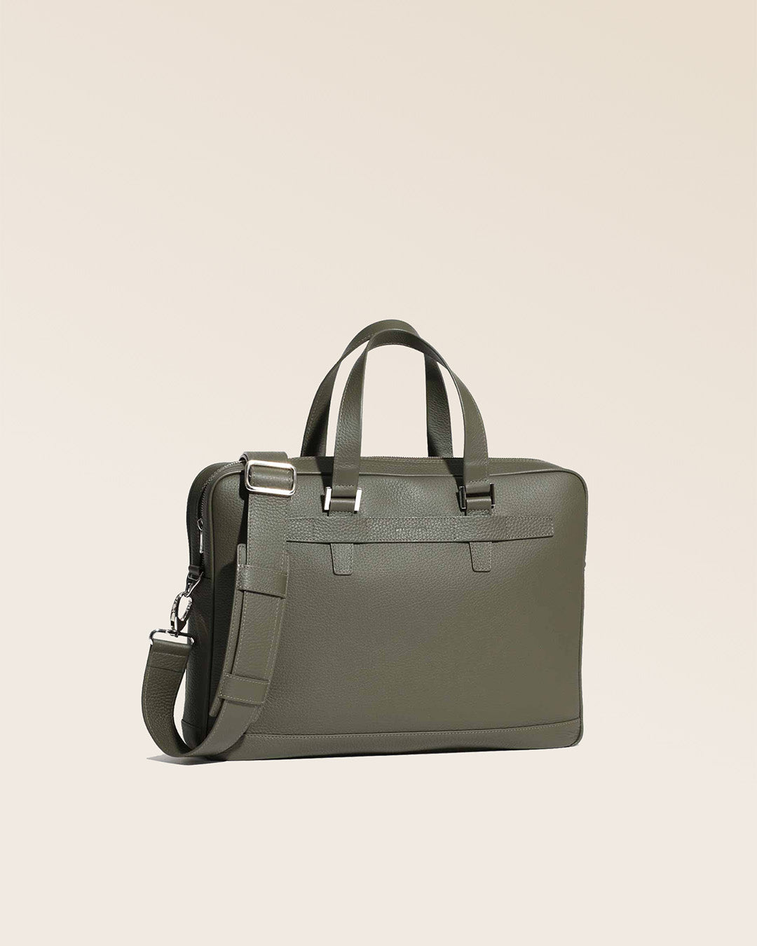 Our Boston satchel bag in khaki vicuña-style leather, seen from the quarter in the studio.