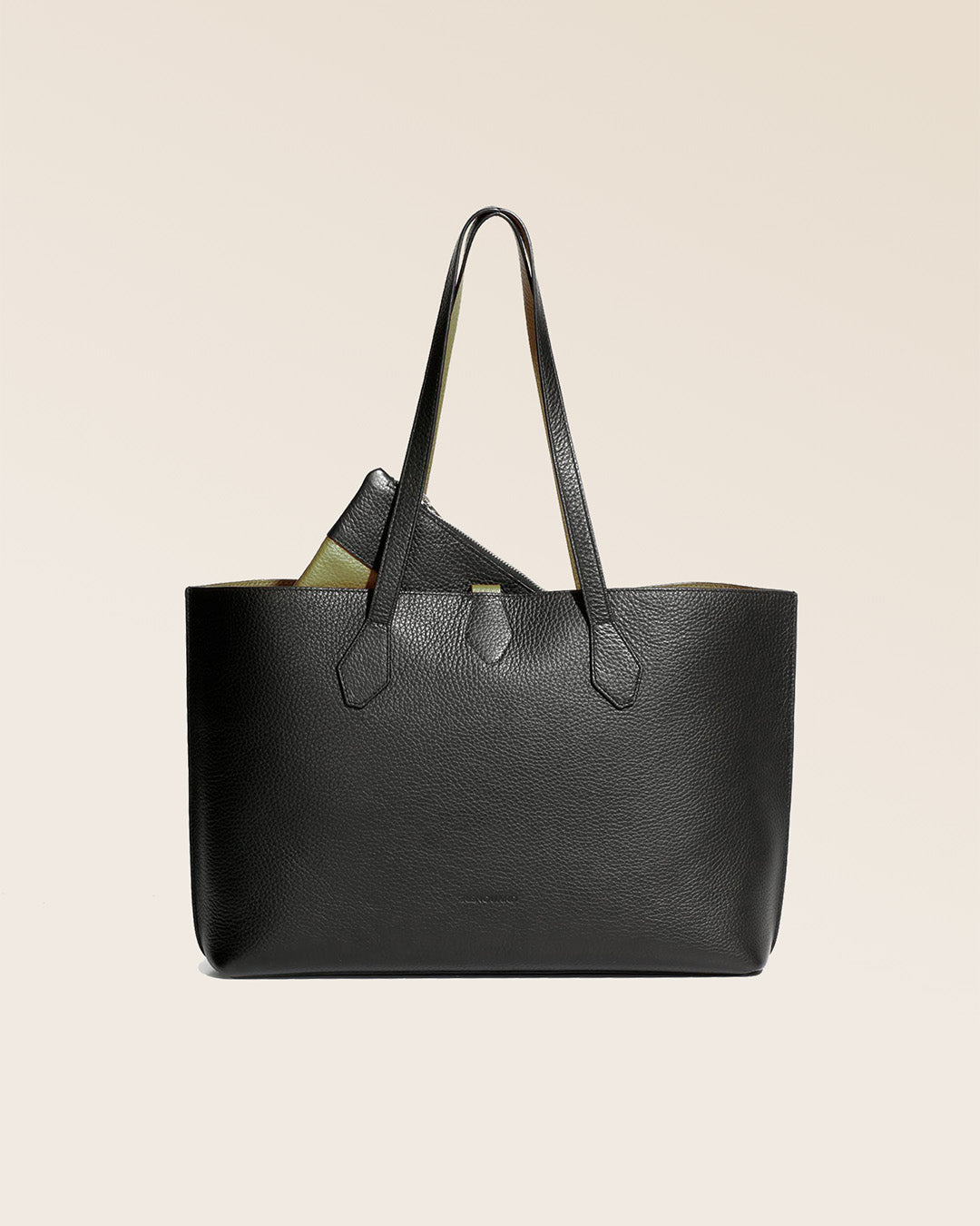 Our Shopper tote bag in black and khaki vicuña-style leather, seen from the front.