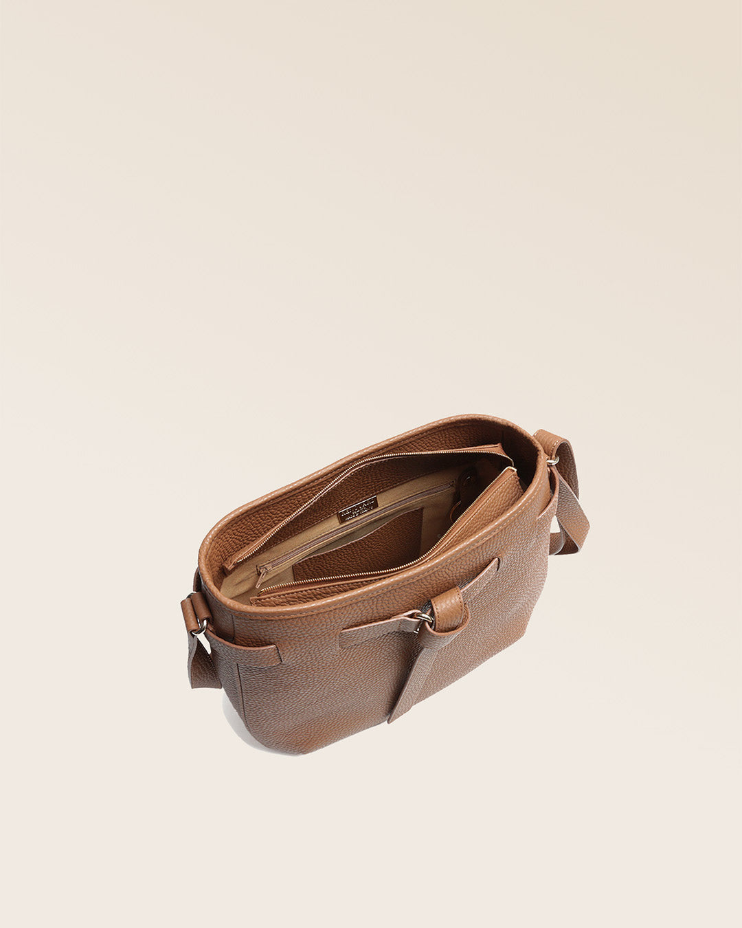 Our Cameron bag in fawn-colored vicuña leather, seen from above in the studio.