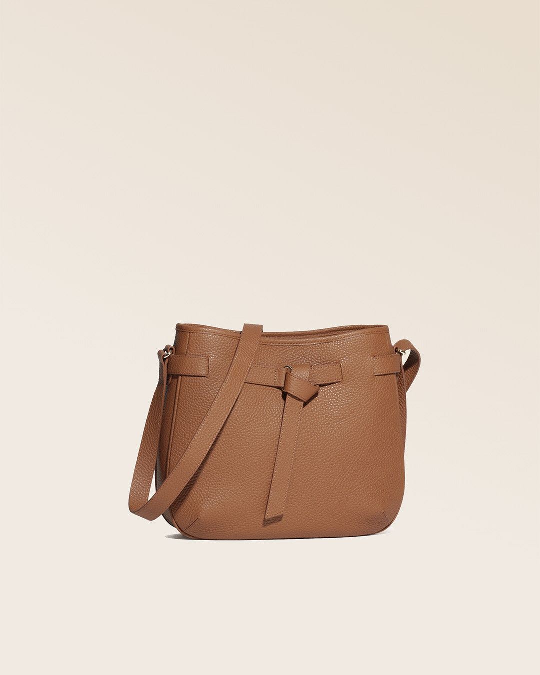 Our Cameron bag in fawn-colored vicuña leather, seen from the quarter in the studio.