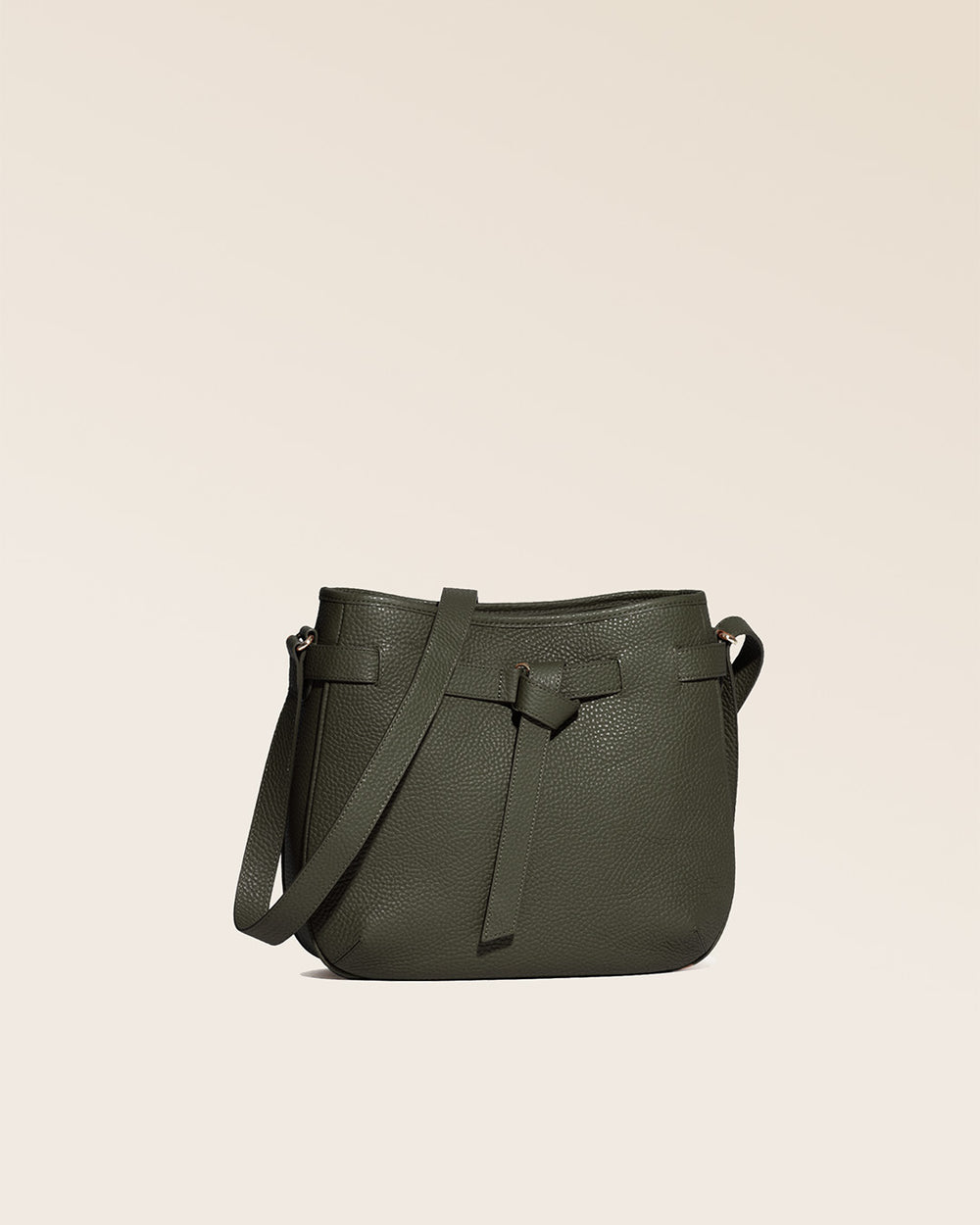 Our Cameron bag in khaki vicuña-style leather, seen from the quarter in the studio.