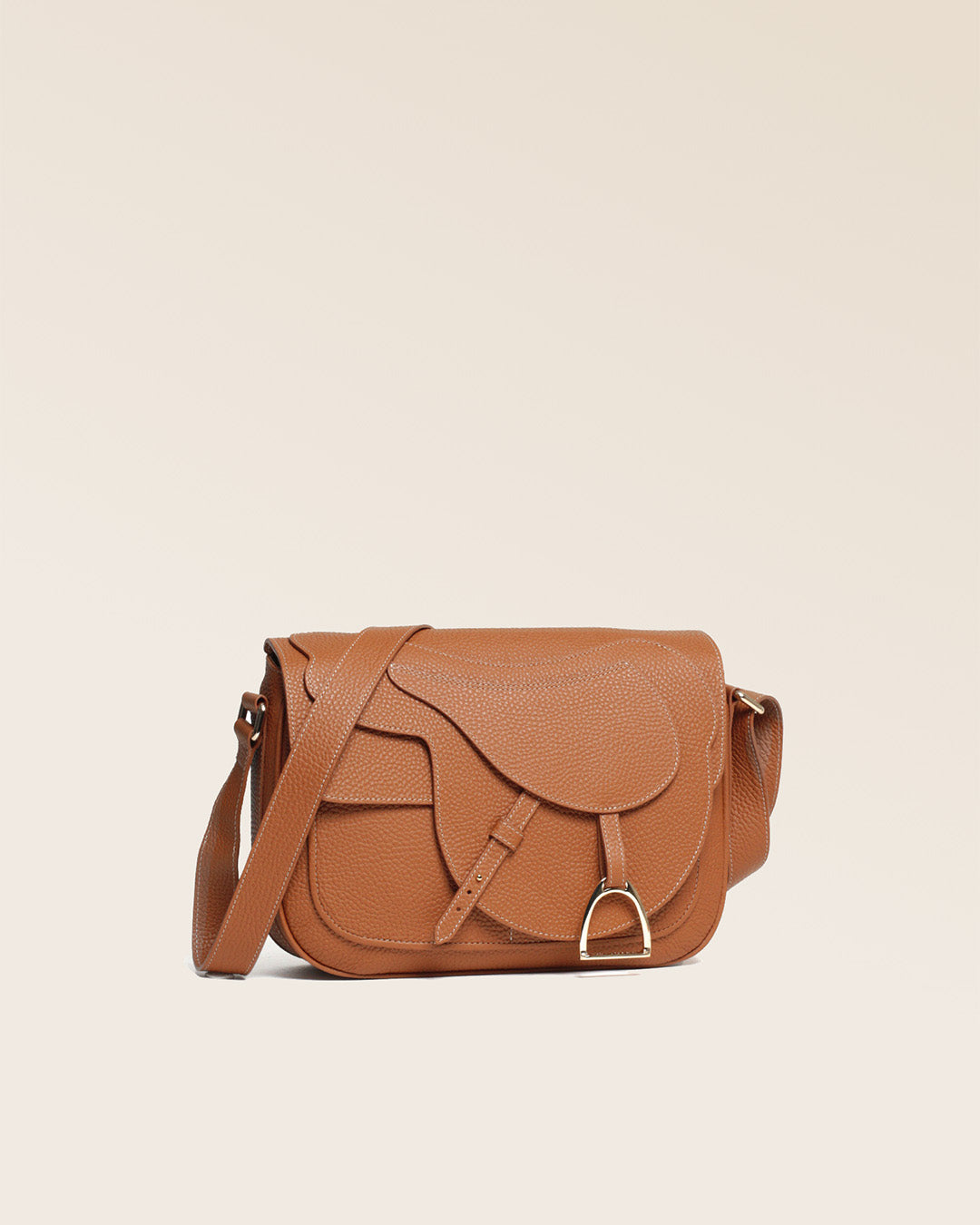 A quarter view of our Casaque bag in fawn-colored vicuña leather.