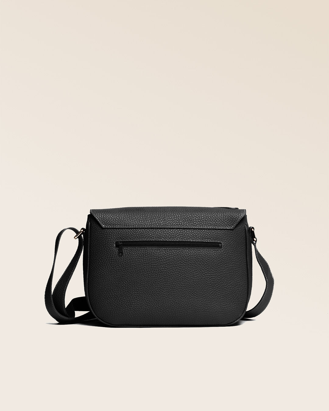 Our Casaque bag in black vicuña-style leather, seen from the back.