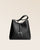 Our large Cob bag in black vicuña-style leather, seen from the front in the studio.