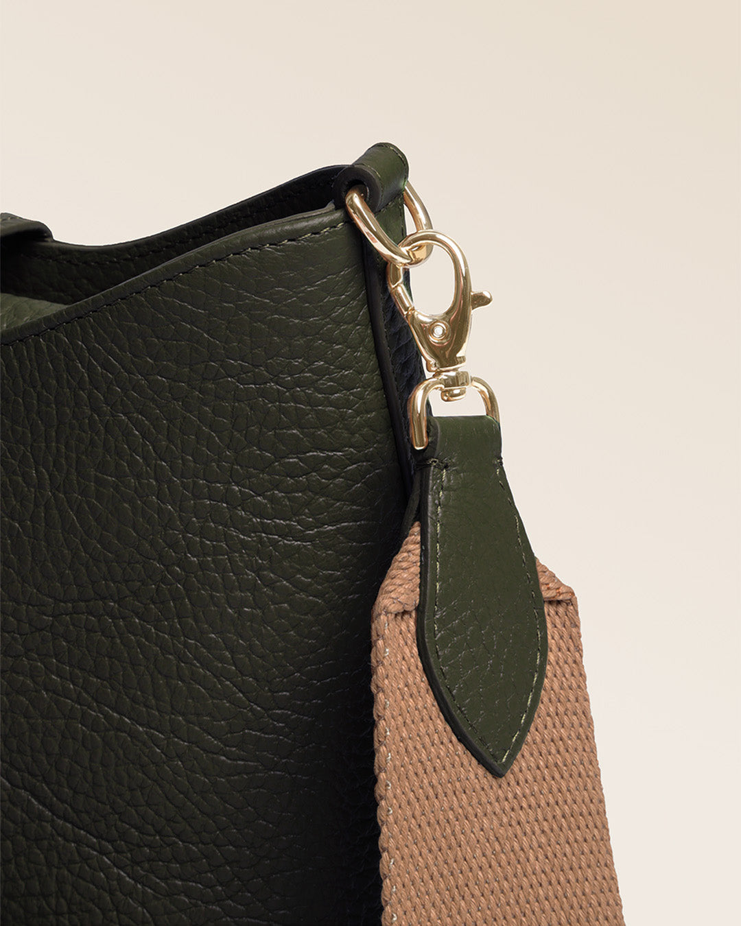 Our Cob Renouard bag in its Mini version, khaki vicuña-style leather and cotton shoulder strap; seen up close in the studio.