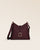 Our Cob Renouard bag in its Petit version, burgundy vicuña-style leather and leather shoulder strap; seen from the front in the studio.