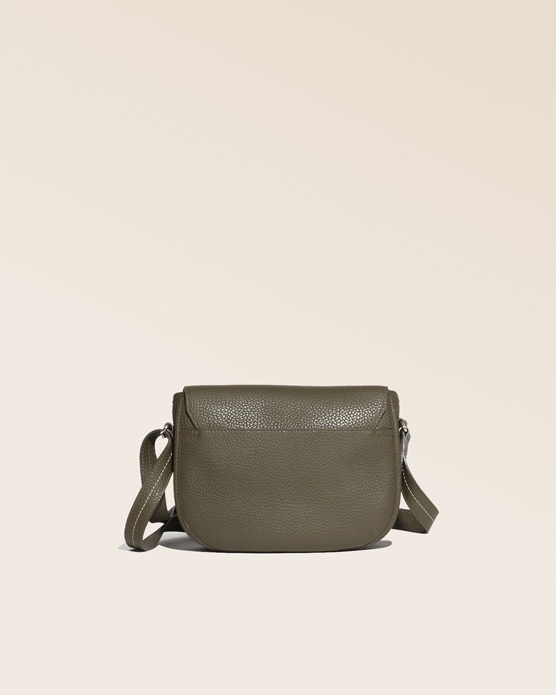Our Léa khaki vicuña-style leather satchel seen from the back in the studio.