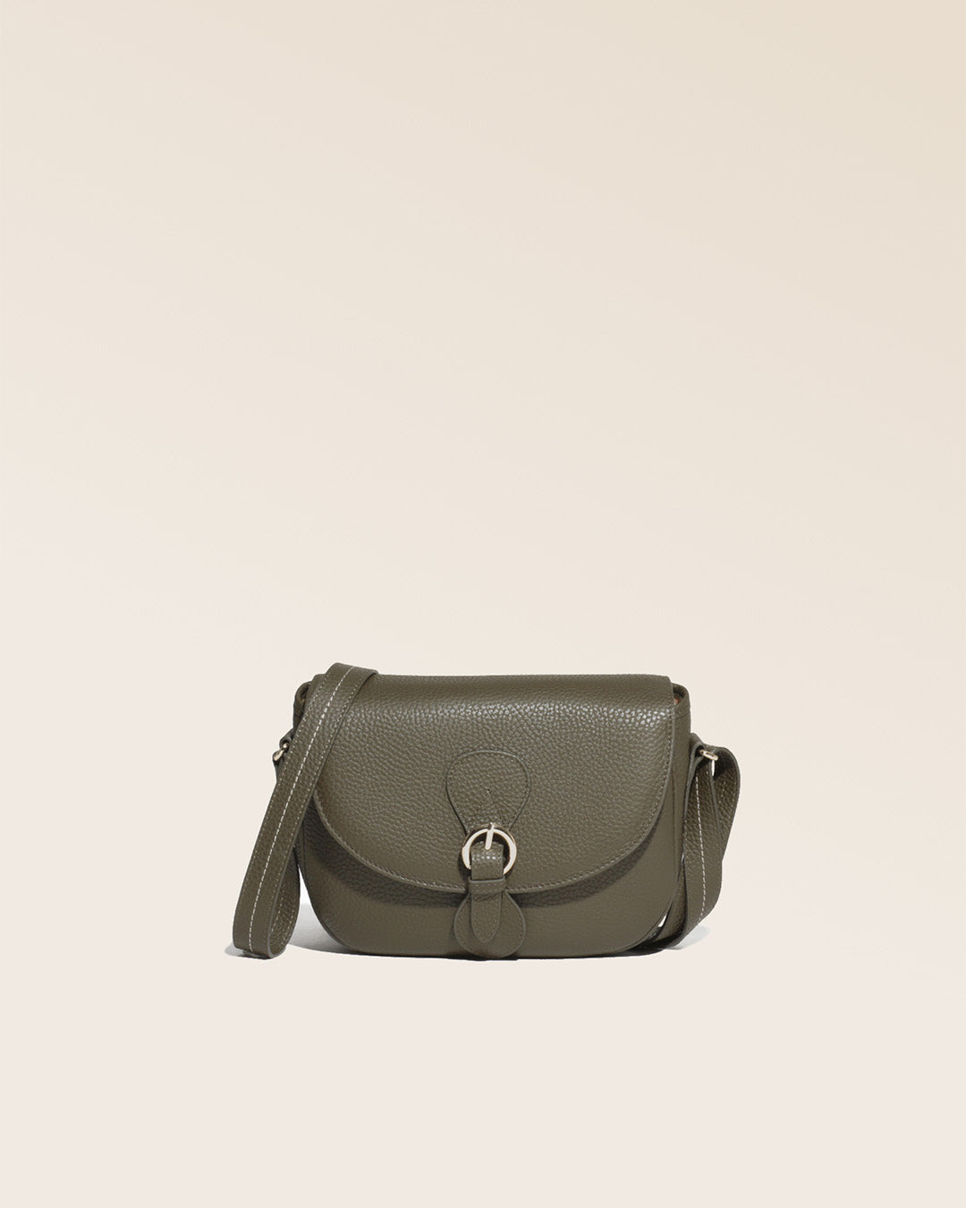 Our Léa khaki vicuña-style leather satchel bag, seen from the front in the studio.