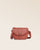 Our Lea terracotta vicuña-style leather satchel bag, seen from the front in the studio.